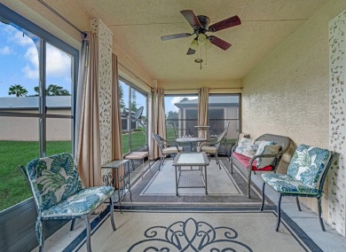 This charming home is located in the highly sought-after Spanish on Spanish Lakes I in Florida - for sale on GolfHomes.com, golf home, golf lot
