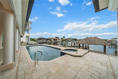 NEVER FLOODED ON THE INSIDE! LOW FLOOD INSURANCE COSTS! This on Royal Tee Country Club in Florida - for sale on GolfHomes.com, golf home, golf lot