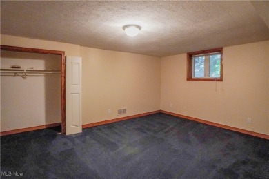 Beautiful 4 bedroom, 3.5 bath custom built home in the sought on Roses Run Country Club in Ohio - for sale on GolfHomes.com, golf home, golf lot