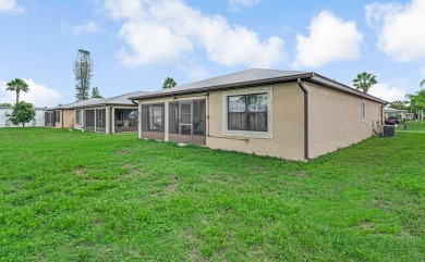 This charming home is located in the highly sought-after Spanish on Spanish Lakes I in Florida - for sale on GolfHomes.com, golf home, golf lot