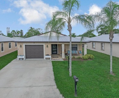 This charming home is located in the highly sought-after Spanish on Spanish Lakes I in Florida - for sale on GolfHomes.com, golf home, golf lot
