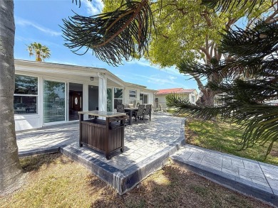 This isn't just a home, It's a LIFESTYLE! Welcome to this on Gulf Harbors Golf Course in Florida - for sale on GolfHomes.com, golf home, golf lot