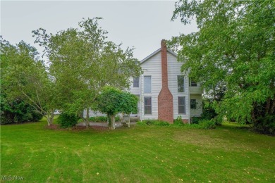 Beautiful 4 bedroom, 3.5 bath custom built home in the sought on Roses Run Country Club in Ohio - for sale on GolfHomes.com, golf home, golf lot