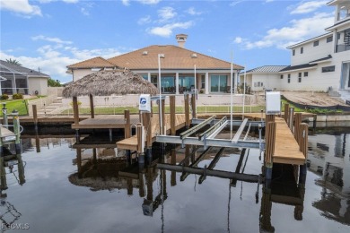 NEVER FLOODED ON THE INSIDE! LOW FLOOD INSURANCE COSTS! This on Royal Tee Country Club in Florida - for sale on GolfHomes.com, golf home, golf lot