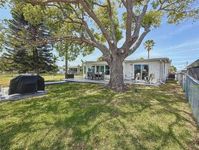 This isn't just a home, It's a LIFESTYLE! Welcome to this on Gulf Harbors Golf Course in Florida - for sale on GolfHomes.com, golf home, golf lot