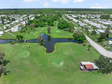 This charming home is located in the highly sought-after Spanish on Spanish Lakes I in Florida - for sale on GolfHomes.com, golf home, golf lot