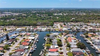 This isn't just a home, It's a LIFESTYLE! Welcome to this on Gulf Harbors Golf Course in Florida - for sale on GolfHomes.com, golf home, golf lot