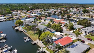 This isn't just a home, It's a LIFESTYLE! Welcome to this on Gulf Harbors Golf Course in Florida - for sale on GolfHomes.com, golf home, golf lot