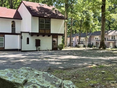 Enjoy golf course views and an unbeatable location near the West on DeSoto Golf Course in Arkansas - for sale on GolfHomes.com, golf home, golf lot
