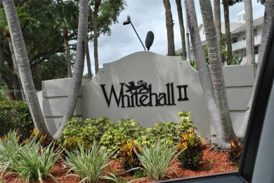 2 BEDROOM 2 BATH WHITEHALL II  CONDO LOCATED IN THE PRIVATE on Pine Island Ridge Country Club in Florida - for sale on GolfHomes.com, golf home, golf lot