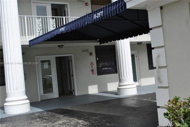 2 BEDROOM 2 BATH WHITEHALL II  CONDO LOCATED IN THE PRIVATE on Pine Island Ridge Country Club in Florida - for sale on GolfHomes.com, golf home, golf lot