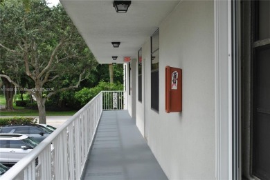 2 BEDROOM 2 BATH WHITEHALL II  CONDO LOCATED IN THE PRIVATE on Pine Island Ridge Country Club in Florida - for sale on GolfHomes.com, golf home, golf lot