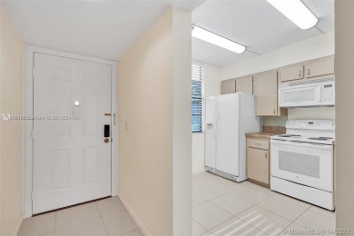 2 BEDROOM 2 BATH WHITEHALL II  CONDO LOCATED IN THE PRIVATE on Pine Island Ridge Country Club in Florida - for sale on GolfHomes.com, golf home, golf lot