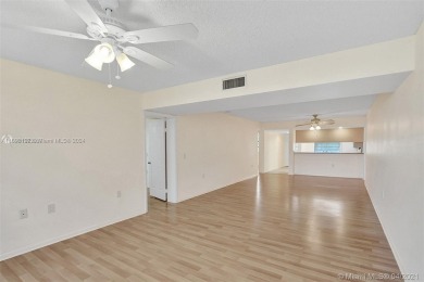2 BEDROOM 2 BATH WHITEHALL II  CONDO LOCATED IN THE PRIVATE on Pine Island Ridge Country Club in Florida - for sale on GolfHomes.com, golf home, golf lot
