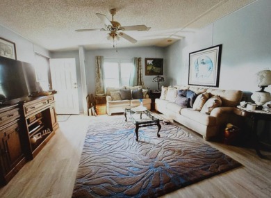 Beautiful 2-Bedroom Palm Harbor Home with Stunning Golf Course on Schalamar Creek Golf and Country Club in Florida - for sale on GolfHomes.com, golf home, golf lot