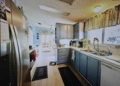 Beautiful 2-Bedroom Palm Harbor Home with Stunning Golf Course on Schalamar Creek Golf and Country Club in Florida - for sale on GolfHomes.com, golf home, golf lot