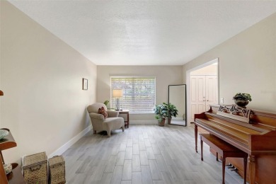 Welcome to this lovingly maintained 4-bedroom, 2.5-bath home on Hunters Green Country Club in Florida - for sale on GolfHomes.com, golf home, golf lot