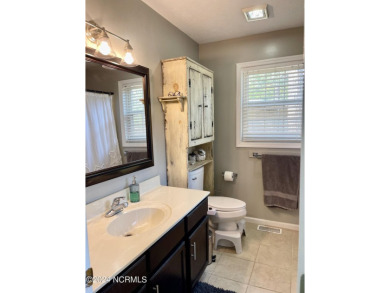 Located just 7 minutes from the world-renowned Pinehurst Resort on Pinehurst Golf Course No. 8 in North Carolina - for sale on GolfHomes.com, golf home, golf lot