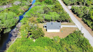 BRAND NEW CONSTRUCTION ON A FRESHWATER CANAL LOT WITH A GREAT on Mirror Lakes Golf Club in Florida - for sale on GolfHomes.com, golf home, golf lot