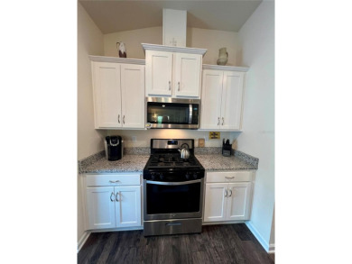 This MOVE- IN READY, LIKE NEW, WATERFRONT home, built in 2022 is on Grand Reserve Golf Course in Florida - for sale on GolfHomes.com, golf home, golf lot