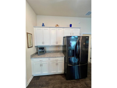This MOVE- IN READY, LIKE NEW, WATERFRONT home, built in 2022 is on Grand Reserve Golf Course in Florida - for sale on GolfHomes.com, golf home, golf lot