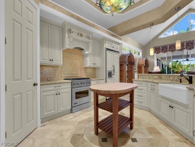 This well-maintained luxury home features a redesigned kitchen on Bonita Bay West in Florida - for sale on GolfHomes.com, golf home, golf lot