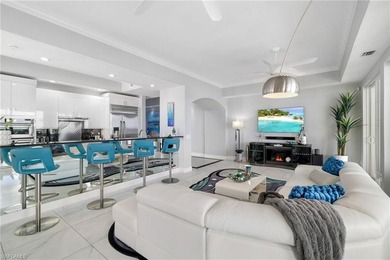 Experience elevated waterfront living in this exceptional on Miromar Lakes Golf Club in Florida - for sale on GolfHomes.com, golf home, golf lot