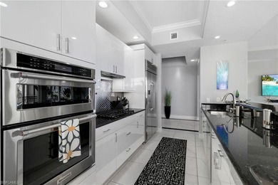 Experience elevated waterfront living in this exceptional on Miromar Lakes Golf Club in Florida - for sale on GolfHomes.com, golf home, golf lot