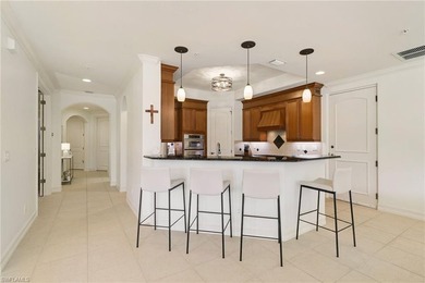 Welcome to this beautifully positioned first-floor Vivaldi on Miromar Lakes Golf Club in Florida - for sale on GolfHomes.com, golf home, golf lot