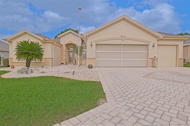 This beautiful Madeira model offers 2 bedrooms, 2 baths plus a on Eagle Ridge At Spruce Creek Country Club in Florida - for sale on GolfHomes.com, golf home, golf lot