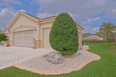 This beautiful Madeira model offers 2 bedrooms, 2 baths plus a on Eagle Ridge At Spruce Creek Country Club in Florida - for sale on GolfHomes.com, golf home, golf lot