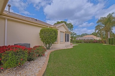 This beautiful Madeira model offers 2 bedrooms, 2 baths plus a on Eagle Ridge At Spruce Creek Country Club in Florida - for sale on GolfHomes.com, golf home, golf lot