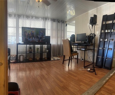 Perfect Property in Sun Air North! Discover this charming on Sun Air Golf Course in Florida - for sale on GolfHomes.com, golf home, golf lot