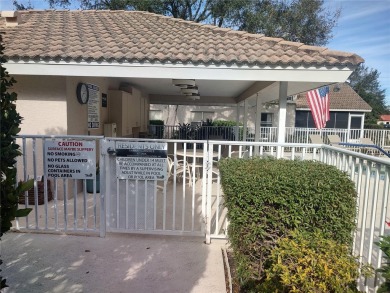 Two bedroom/two bath GROUND floor condo in Fairway Gardens II at on Tara Golf and Country Club in Florida - for sale on GolfHomes.com, golf home, golf lot