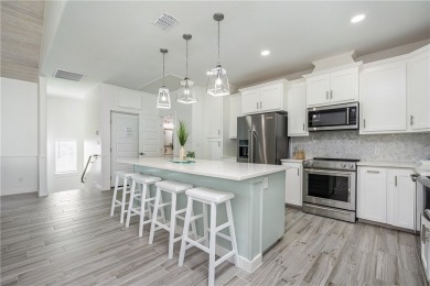 Gorgeous 4 bedroom townhome with water view in town! This 3 on Palmilla Beach Golf Club in Texas - for sale on GolfHomes.com, golf home, golf lot