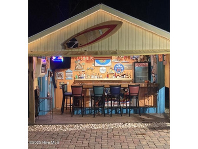 Experience the charm of the Windsong Community, located within on Brick Landing Plantation Yacht and Golf Club in North Carolina - for sale on GolfHomes.com, golf home, golf lot