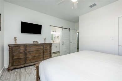 Gorgeous 4 bedroom townhome with water view in town! This 3 on Palmilla Beach Golf Club in Texas - for sale on GolfHomes.com, golf home, golf lot