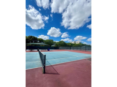 Rarely available waterfront villa! Experience serene lakefront on Palm-Aire Country Club and Resort - Palms in Florida - for sale on GolfHomes.com, golf home, golf lot