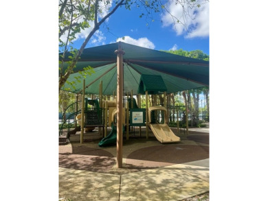 Rarely available waterfront villa! Experience serene lakefront on Palm-Aire Country Club and Resort - Palms in Florida - for sale on GolfHomes.com, golf home, golf lot