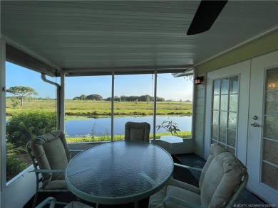 What a view! Canal! Wildlife! Golf! You have it all from your on Indianwood Golf and Country Club in Florida - for sale on GolfHomes.com, golf home, golf lot