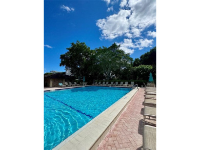 Rarely available waterfront villa! Experience serene lakefront on Palm-Aire Country Club and Resort - Palms in Florida - for sale on GolfHomes.com, golf home, golf lot