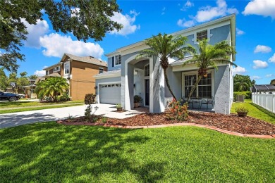 Commanding golf course views and elegant architectural details on Heritage Harbor Golf and Country Club in Florida - for sale on GolfHomes.com, golf home, golf lot