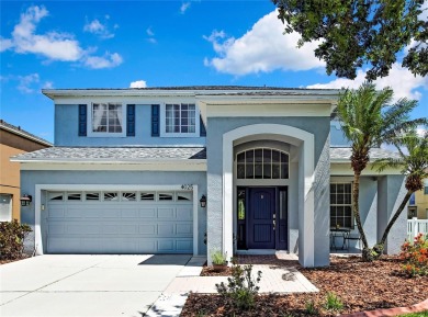 Commanding golf course views and elegant architectural details on Heritage Harbor Golf and Country Club in Florida - for sale on GolfHomes.com, golf home, golf lot