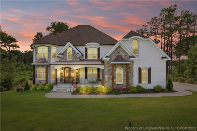Beautiful custom built waterfront home on #5 fairway in Gated on Kings Grant Golf and Country Club in North Carolina - for sale on GolfHomes.com, golf home, golf lot