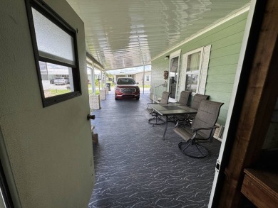 Don't miss this immaculate 2/2, 1248 sf home in the highly on Lake Henry Golf Club in Florida - for sale on GolfHomes.com, golf home, golf lot