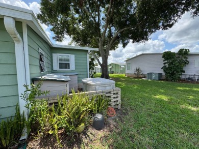 Don't miss this immaculate 2/2, 1248 sf home in the highly on Lake Henry Golf Club in Florida - for sale on GolfHomes.com, golf home, golf lot