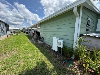 Don't miss this immaculate 2/2, 1248 sf home in the highly on Lake Henry Golf Club in Florida - for sale on GolfHomes.com, golf home, golf lot