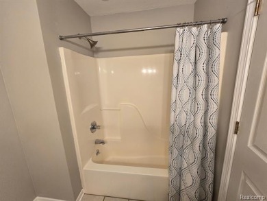 Welcome Home! This fully renovated 2-bedroom, 2-bath condo in on Fenton Farms Golf Club in Michigan - for sale on GolfHomes.com, golf home, golf lot