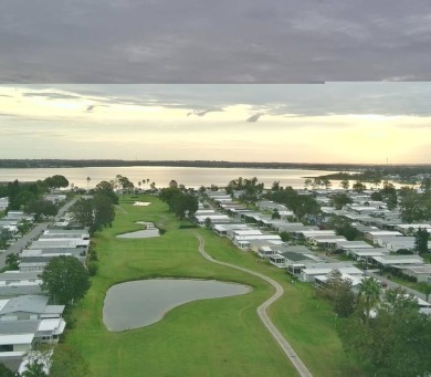 Don't miss this immaculate 2/2, 1248 sf home in the highly on Lake Henry Golf Club in Florida - for sale on GolfHomes.com, golf home, golf lot
