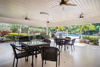 GEORGEOUS CUSTOM DESIGNED, DECORATED AND FURNISHED 3 BED TWO & on Palm-Aire Country Club and Resort - The Oaks in Florida - for sale on GolfHomes.com, golf home, golf lot